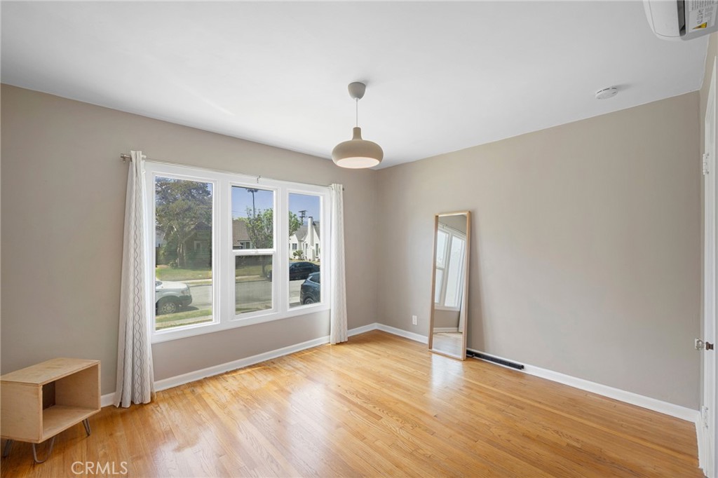 635 Arden Avenue Glendale, CA 91202 - Photo 13 of 36 a view of empty room with wooden floor and fan