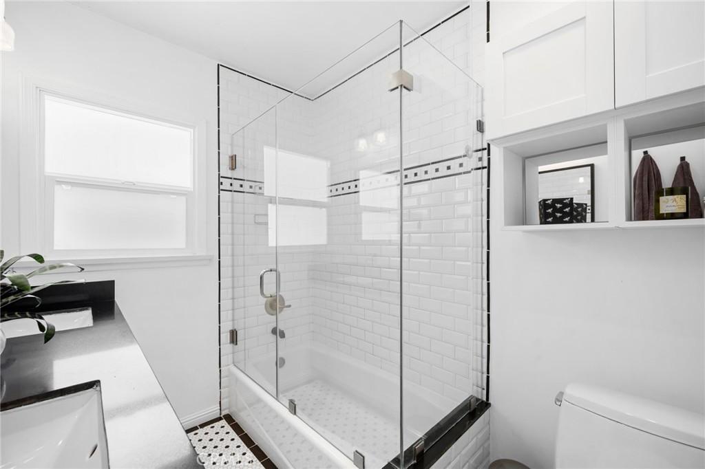 635 Arden Avenue Glendale, CA 91202 - Photo 16 of 36 a bathroom with a shower and a toilet