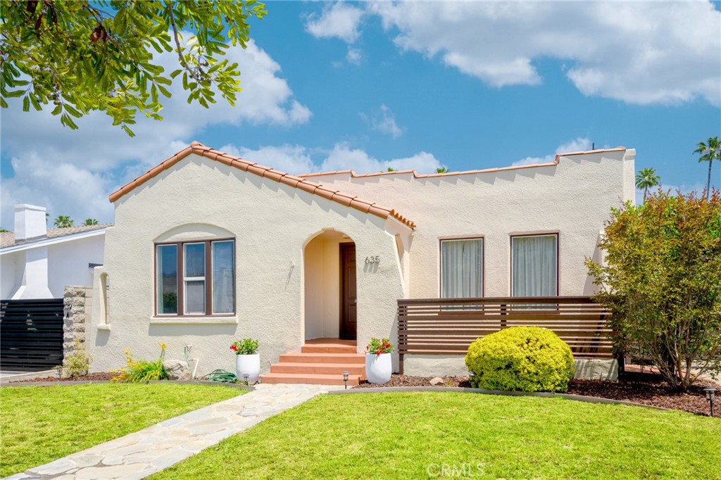 635 Arden Avenue Glendale, CA 91202 - Photo 2 of 36 a front view of a house with a garden