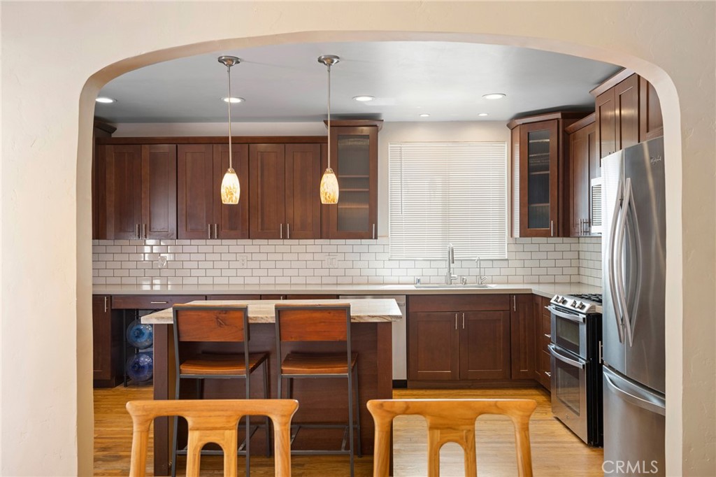 635 Arden Avenue Glendale, CA 91202 - Photo 32 of 36 a bathroom with a sink and a mirror