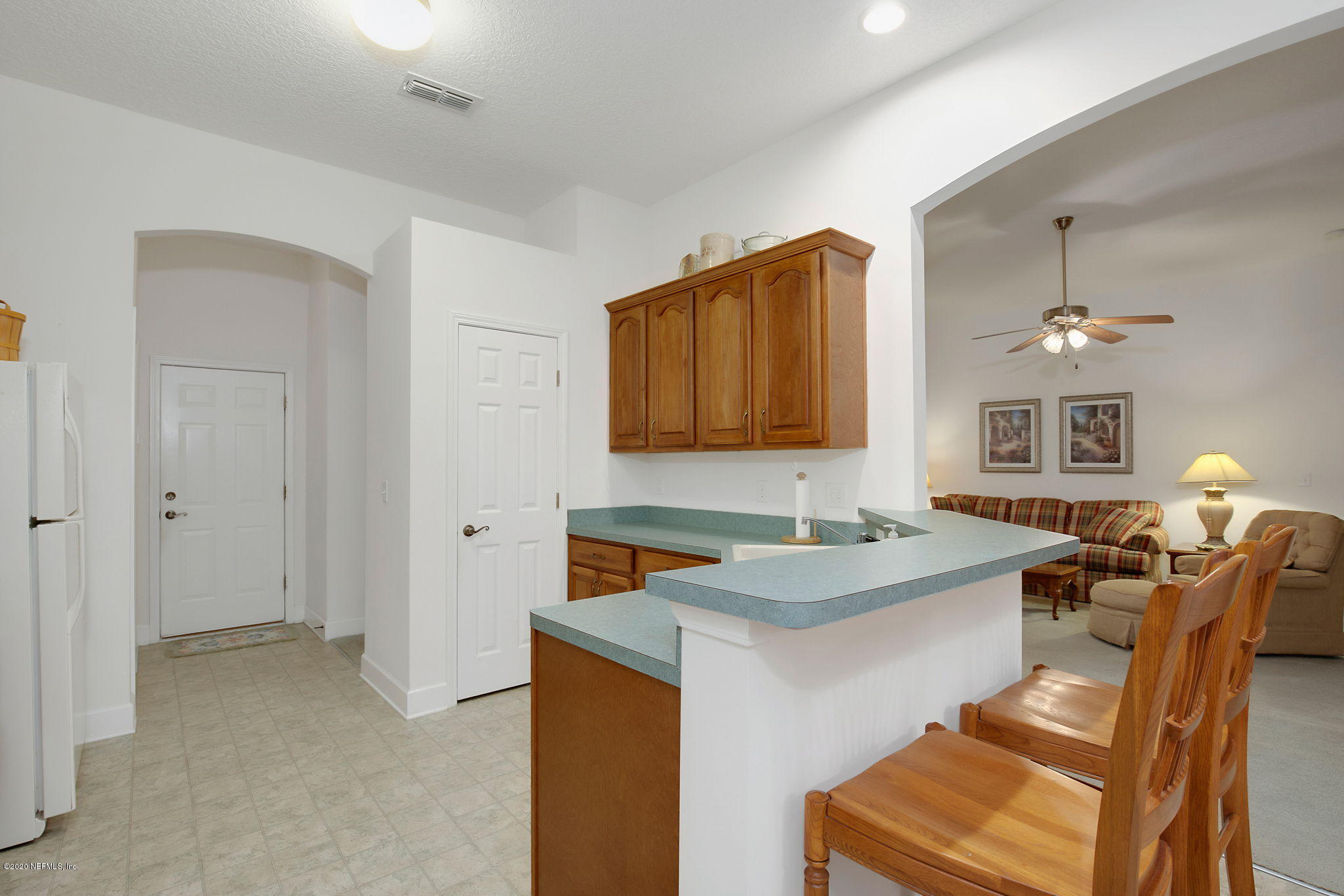 1545 Crichton Road West Jacksonville, FL 32221 - Photo 19 of 30 a spacious bathroom with a sink and a mirror