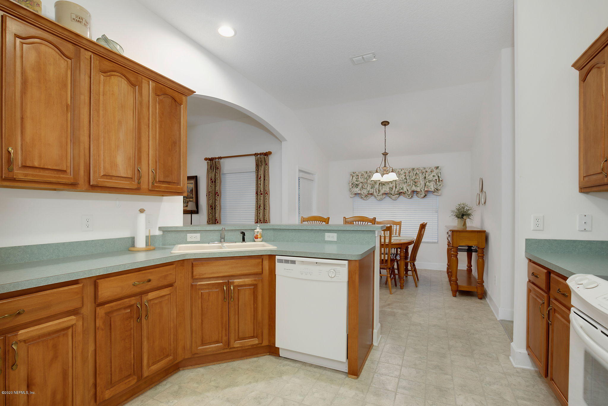 1545 Crichton Road West Jacksonville, FL 32221 - Photo 20 of 30 a kitchen with a sink and cabinets