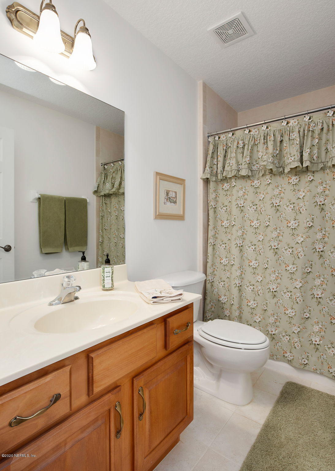 1545 Crichton Road West Jacksonville, FL 32221 - Photo 23 of 30 a bathroom with a sink toilet and shower