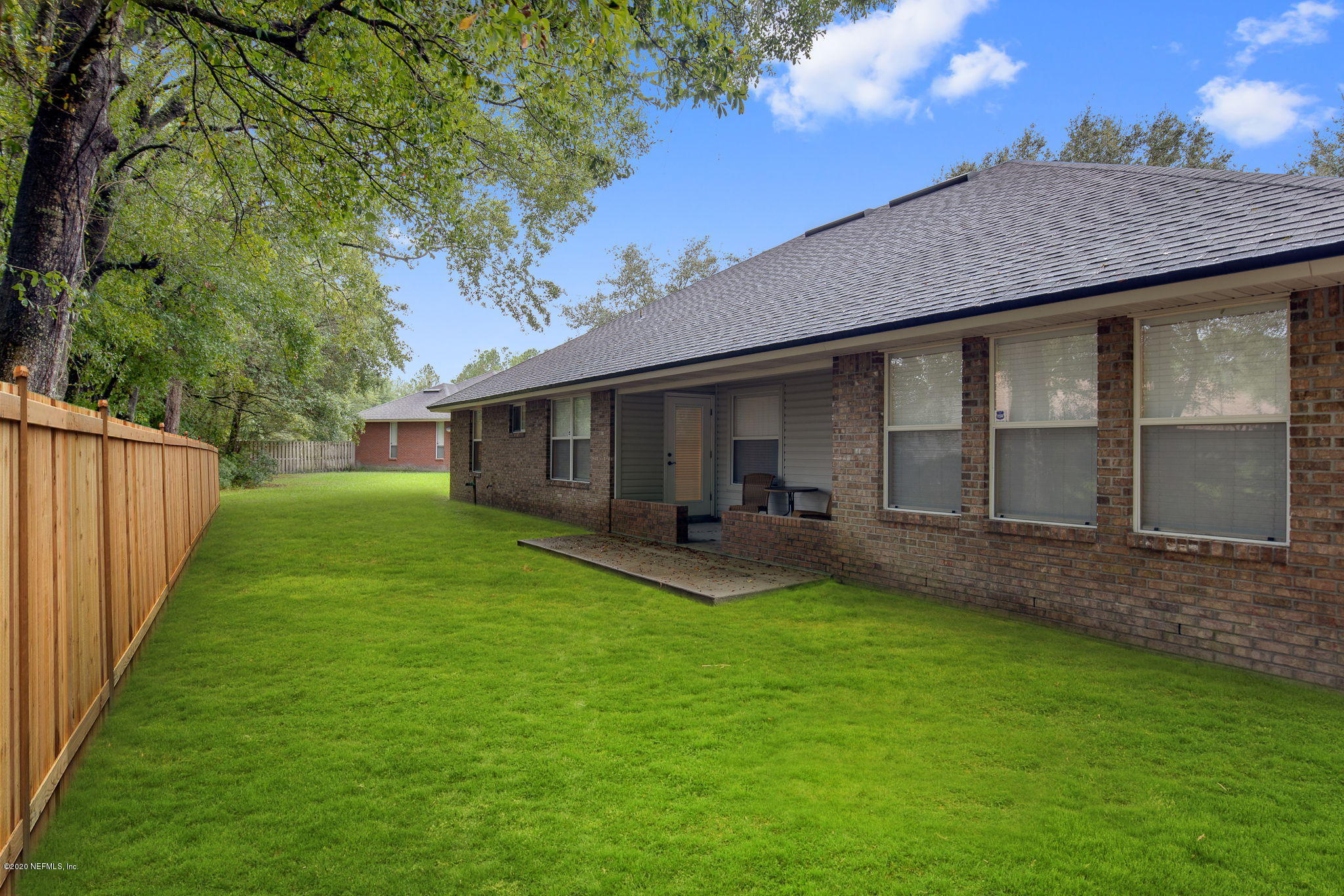 1545 Crichton Road West Jacksonville, FL 32221 - Photo 28 of 30 a view of a house with a yard and sitting area