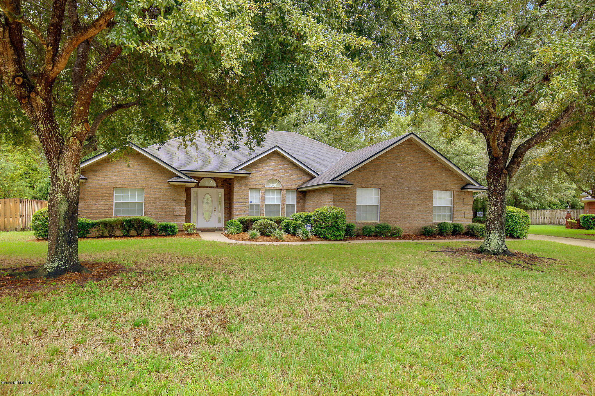 1545 Crichton Road West Jacksonville, FL 32221 - Photo 29 of 30 a front view of house with yard and green space