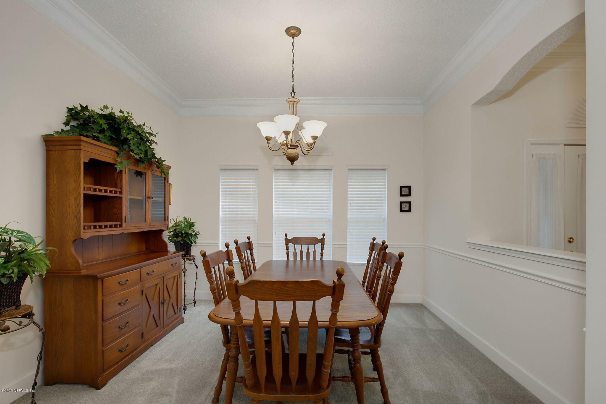 1545 Crichton Road West Jacksonville, FL 32221 - Photo 8 of 30 a dining room with furniture and window