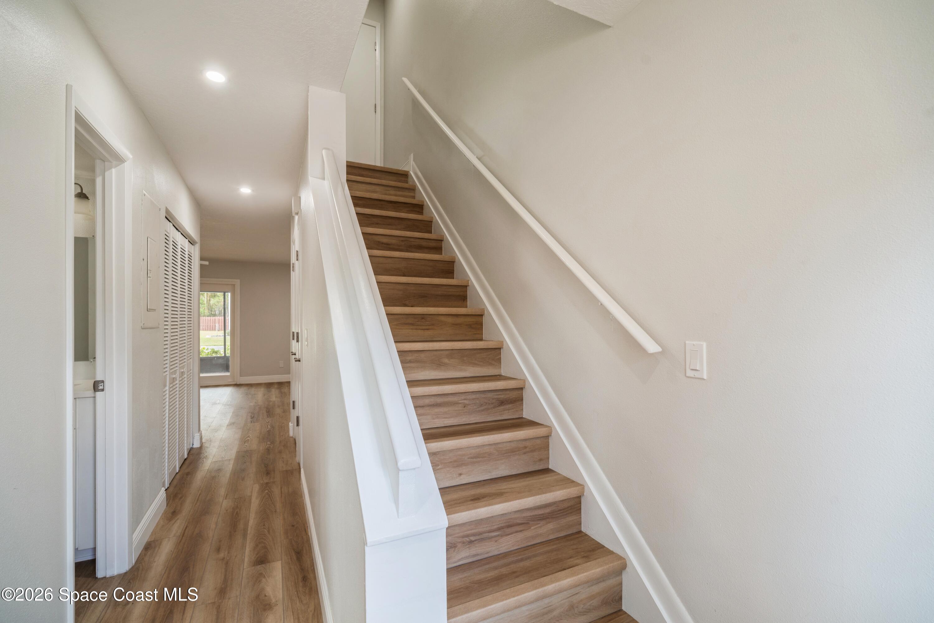 2018 Manor Drive Northeast Palm Bay, FL 32905 - Photo 16 of 29 a view of entryway and hall with wooden floor