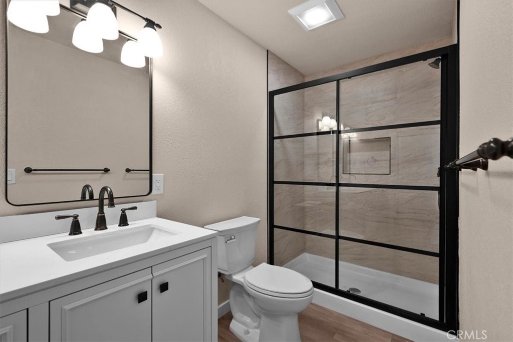 8395 Amapoa Atascadero, CA 93422 - Photo 14 of 22 a bathroom with a sink toilet and shower