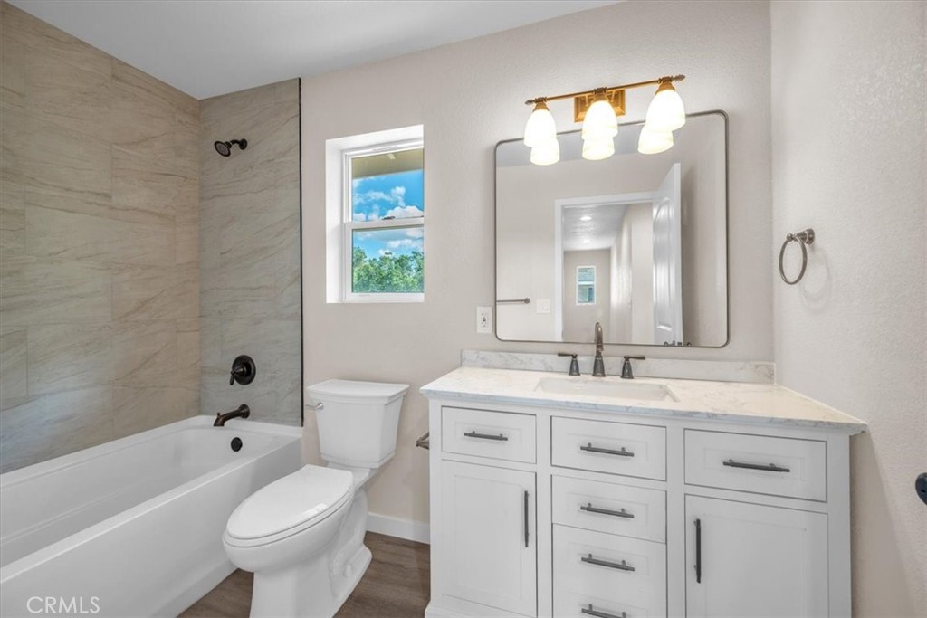 8395 Amapoa Atascadero, CA 93422 - Photo 18 of 22 a bathroom with a sink a toilet and a bathtub