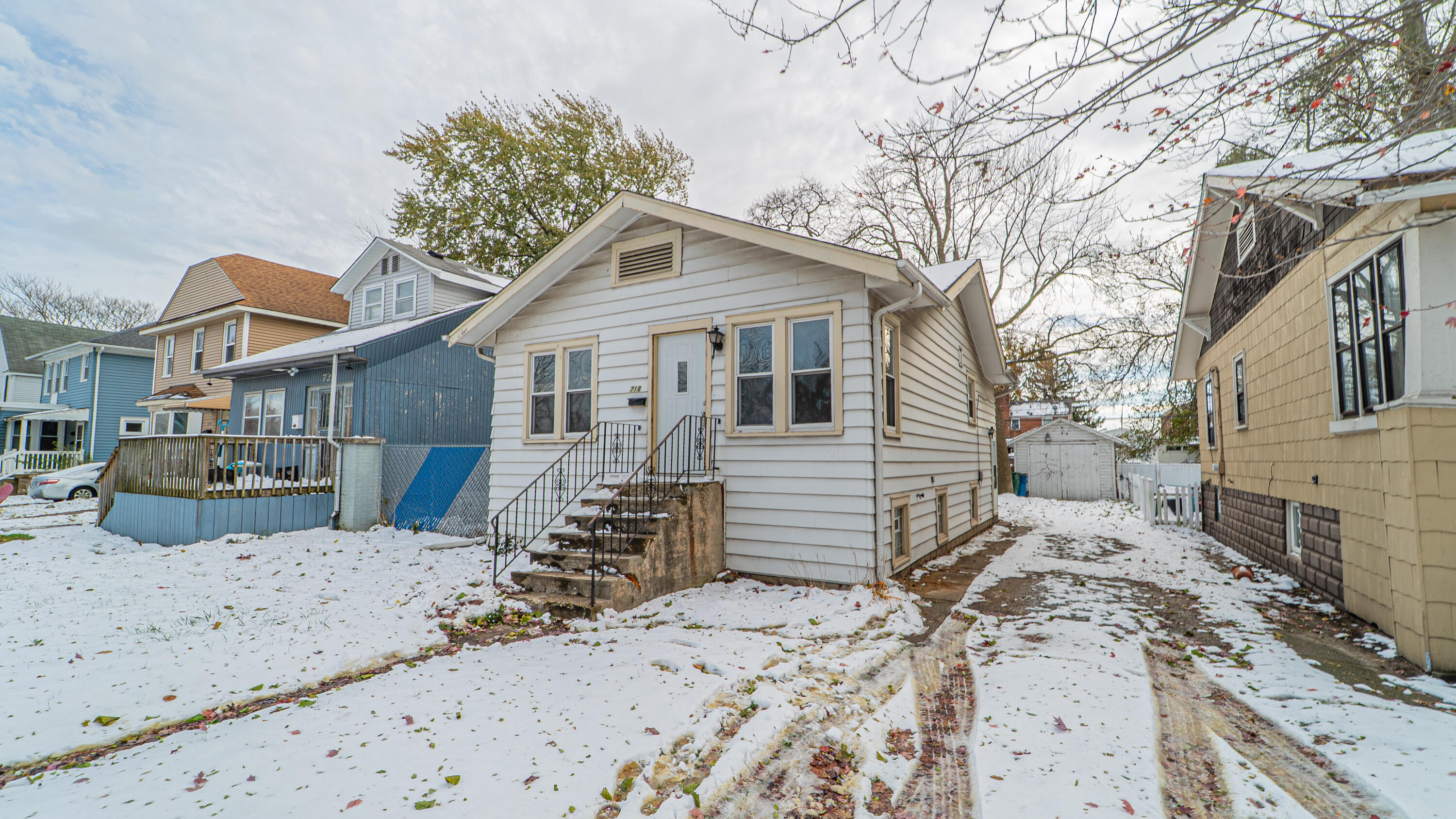 718 Cherry Street Hammond, IN 46324 - Photo 1 of 17 a view of a yard with a large tree