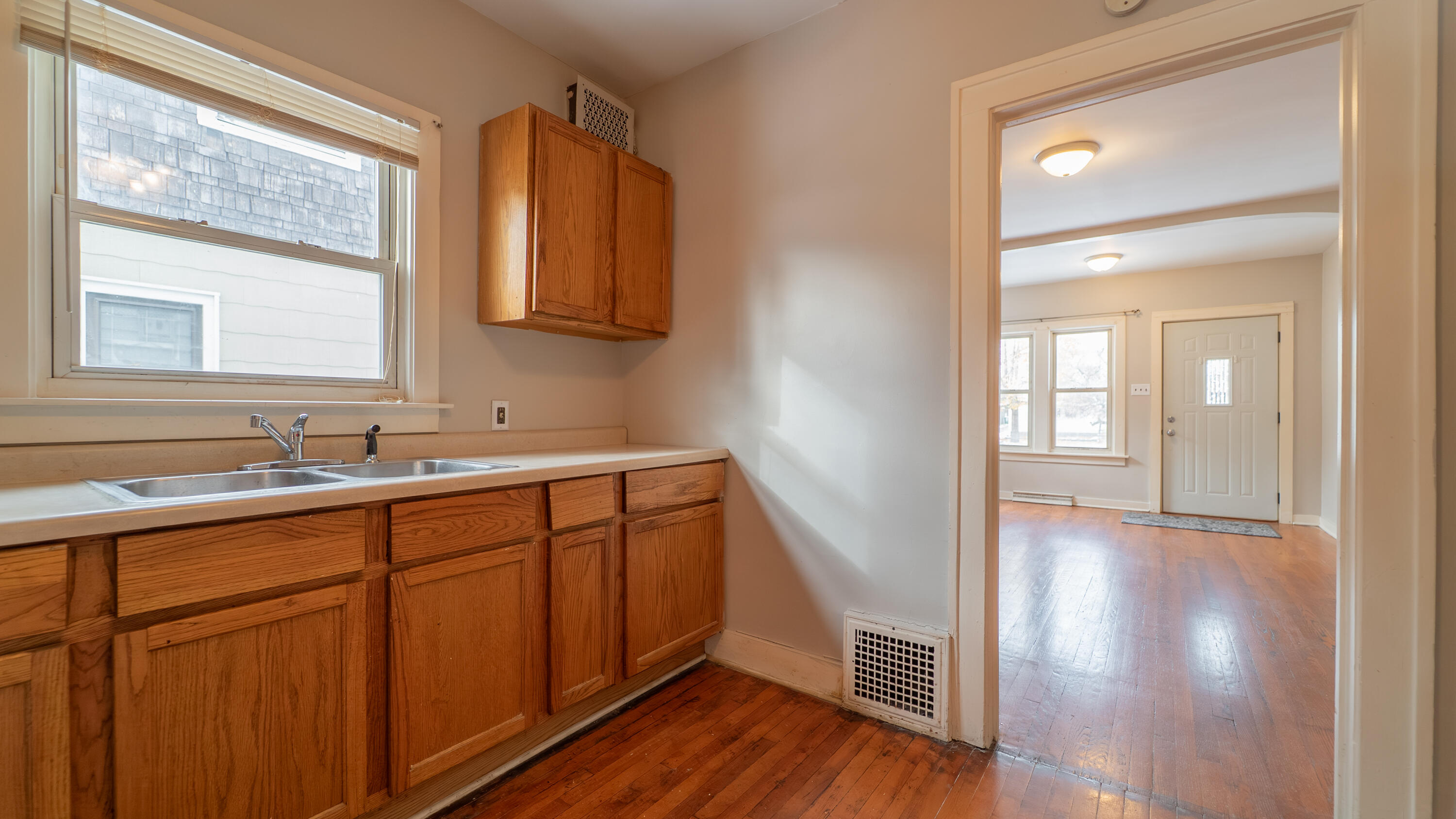 718 Cherry Street Hammond, IN 46324 - Photo 7 of 17 a bathroom with a sink and a mirror