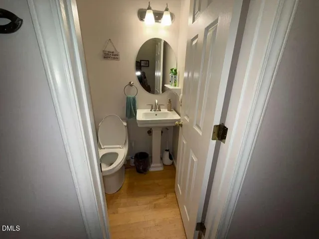 a bedroom with a bed and closet