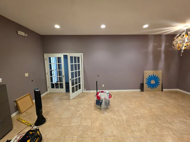 a bathroom with a tub and a shower