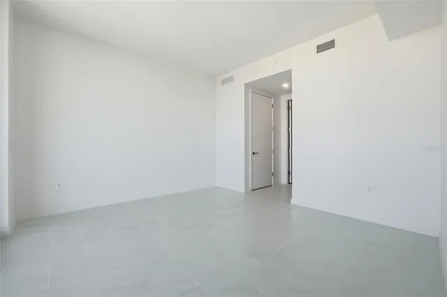 a picture of a glass door and a balcony