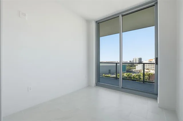 a view of a city with tall buildings