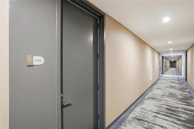 a kitchen with stainless steel appliances a stove and more cabinets