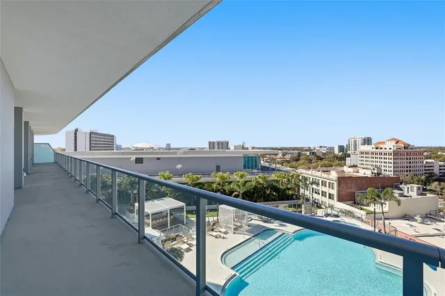 a room with furniture and view kitchen