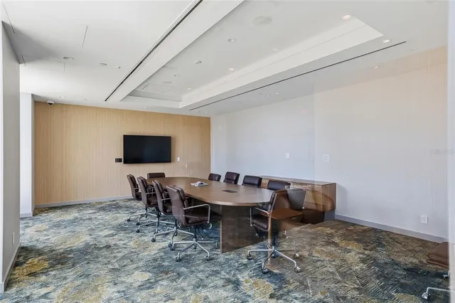 a view of a park with large trees