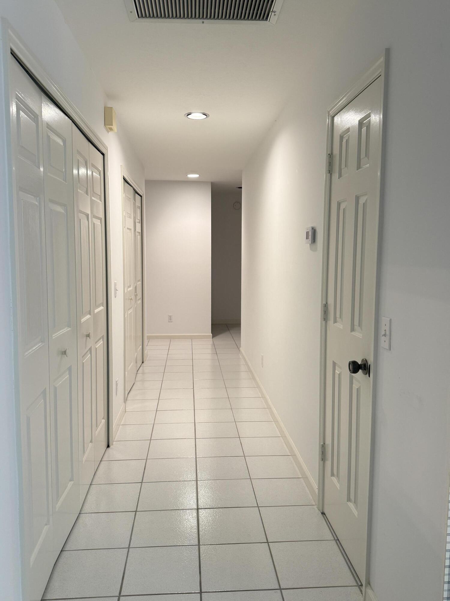 6539 Southeast Held Court Stuart, FL 34997 - Photo 17 of 34 a view of a hallway