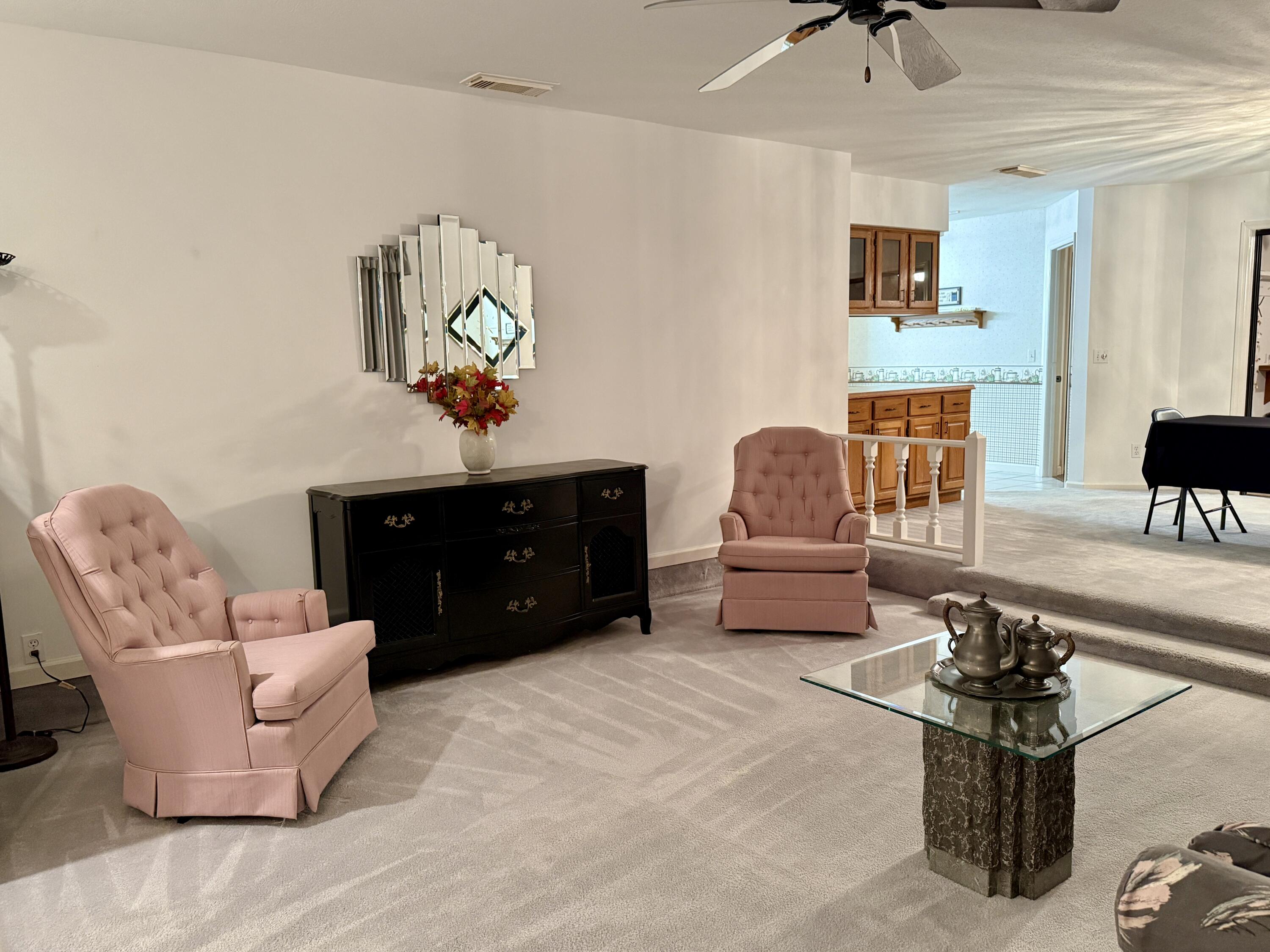 6539 Southeast Held Court Stuart, FL 34997 - Photo 5 of 34 a living room with furniture and a couch