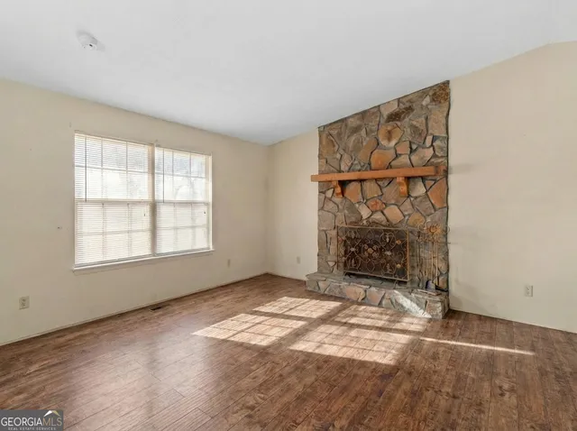 an empty room with windows