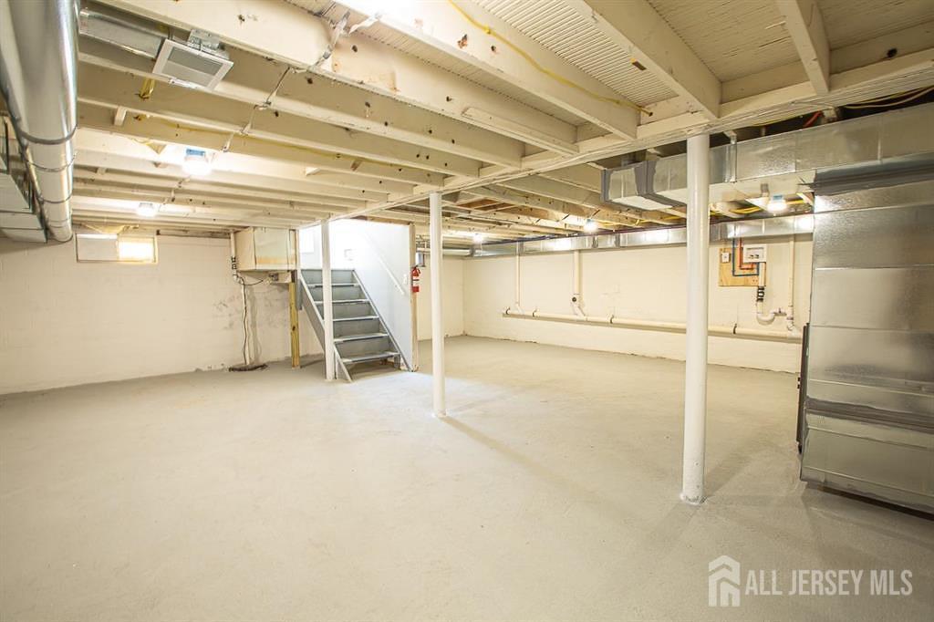 213 Summerhill Road Spotswood, NJ 08884 - Photo 18 of 21 a view of a garage