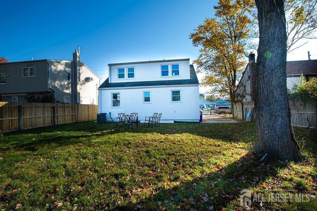 213 Summerhill Road Spotswood, NJ 08884 - Photo 21 of 21 a house view with a garden space
