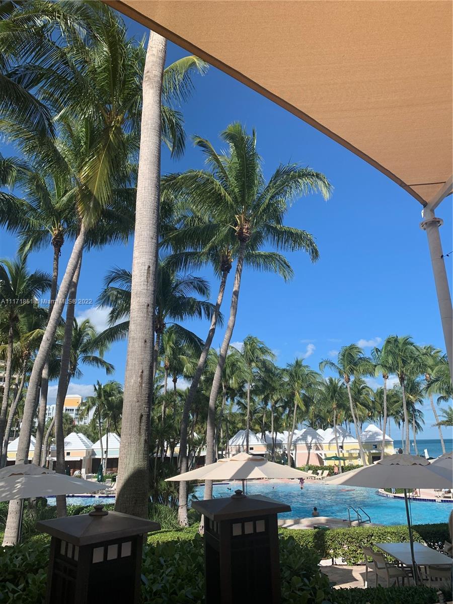 Key Biscayne Key Biscayne, FL 33149 - Photo 16 of 18 a view of multiple houses with a yard