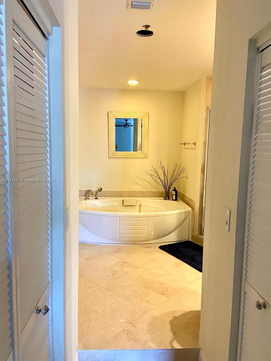Key Biscayne Key Biscayne, FL 33149 - Photo 8 of 18 a view of bathroom with a tub and sink