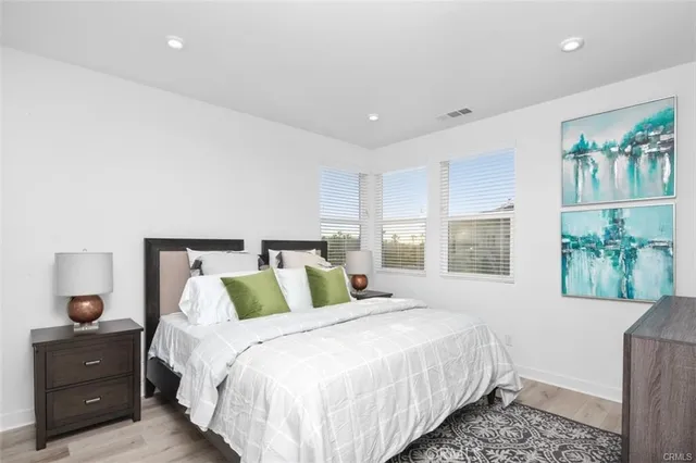 a bathroom with a shower sink and mirror