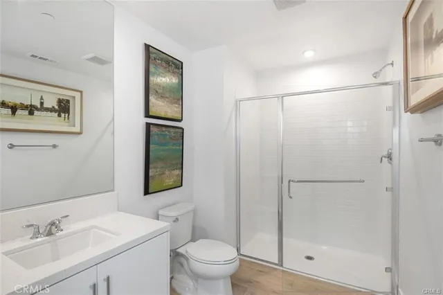 a spacious bedroom with a bed and window