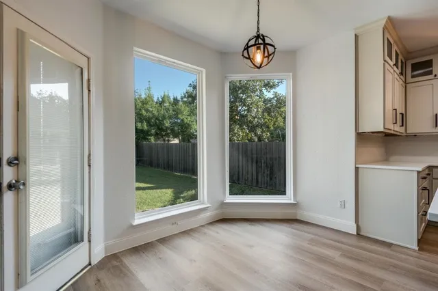 a view of livingroom with furniture wooden floor and window
