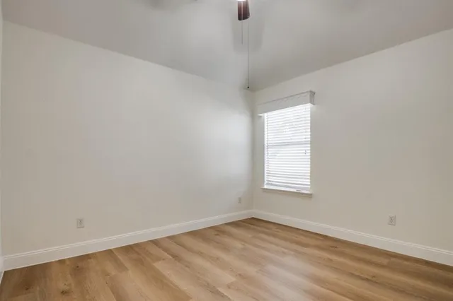 a view of yard with swimming pool