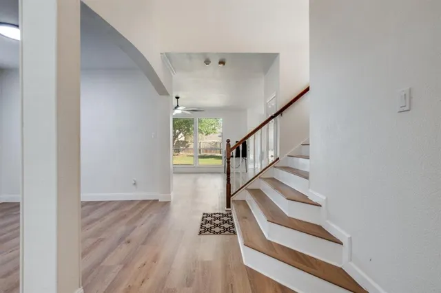 a view of entryway with wooden floor