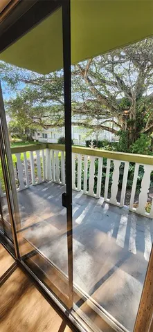 a view of a balcony with city view
