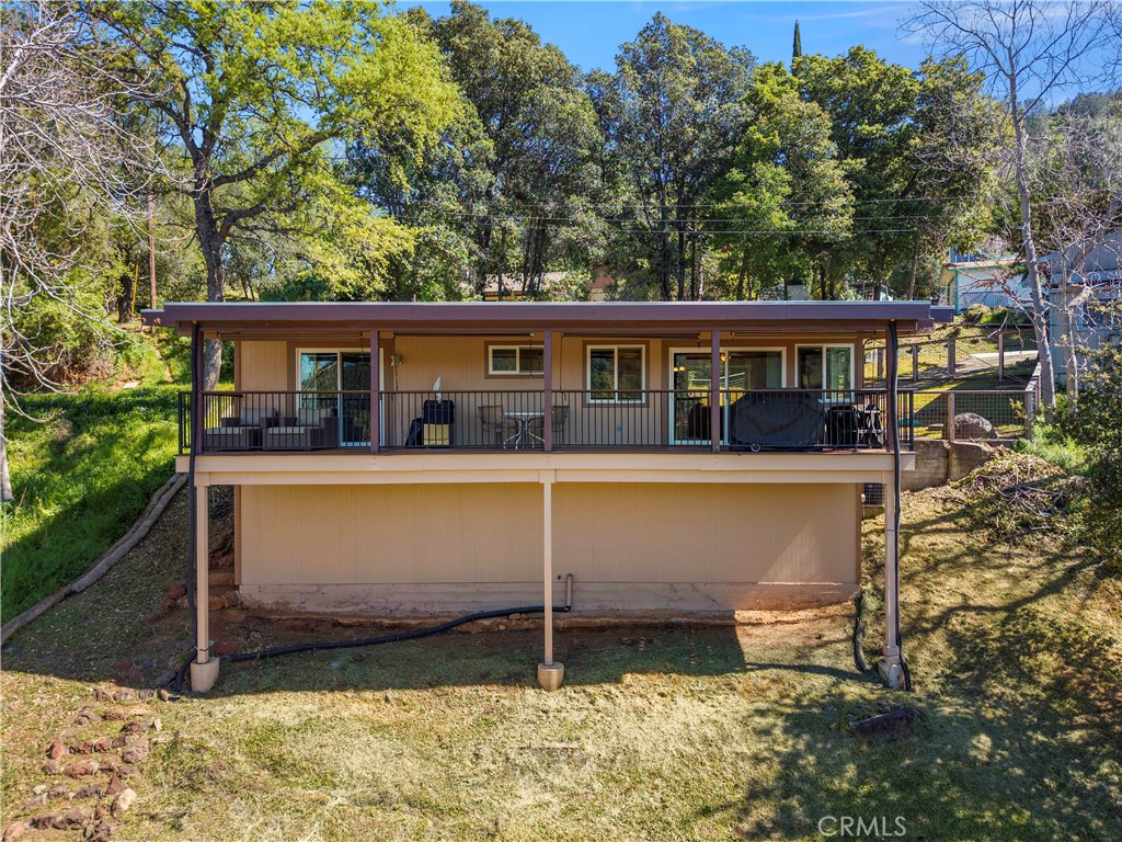 3103 Manzanita Road Kelseyville, CA 95451 - Photo 2 of 62 a view of a house with a yard