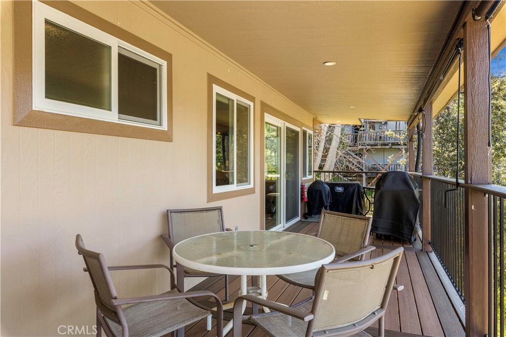 3103 Manzanita Road Kelseyville, CA 95451 - Photo 45 of 62 a view of a dining room with furniture window and outside view