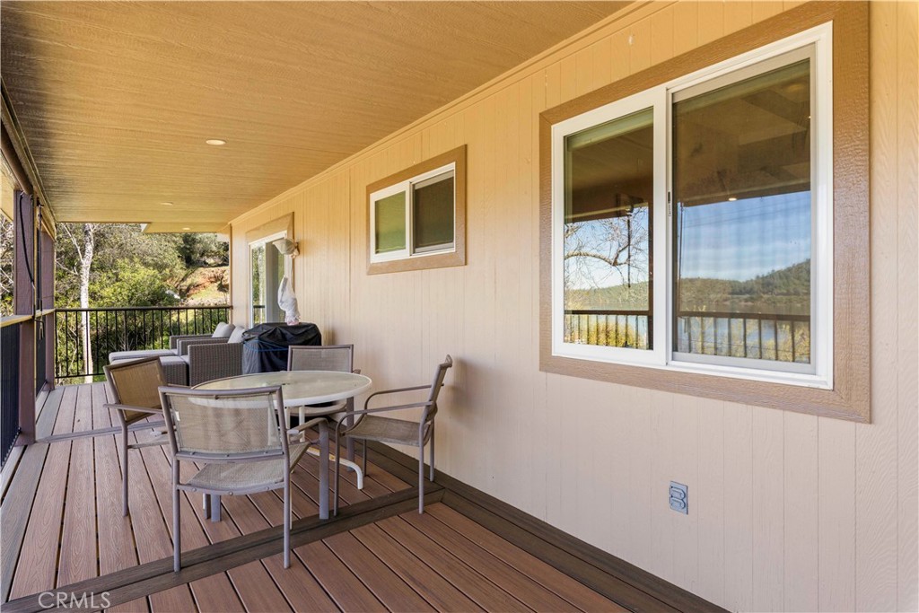 3103 Manzanita Road Kelseyville, CA 95451 - Photo 46 of 62 a view of a dining room with furniture and wooden floor