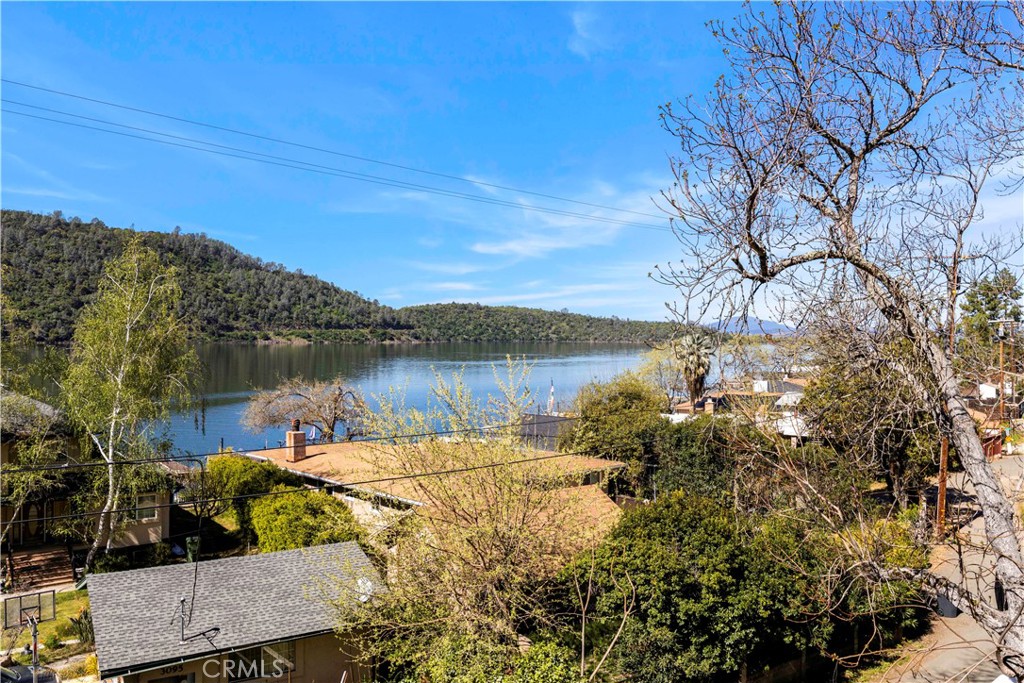 3103 Manzanita Road Kelseyville, CA 95451 - Photo 49 of 62 a view of a lake with houses in the background