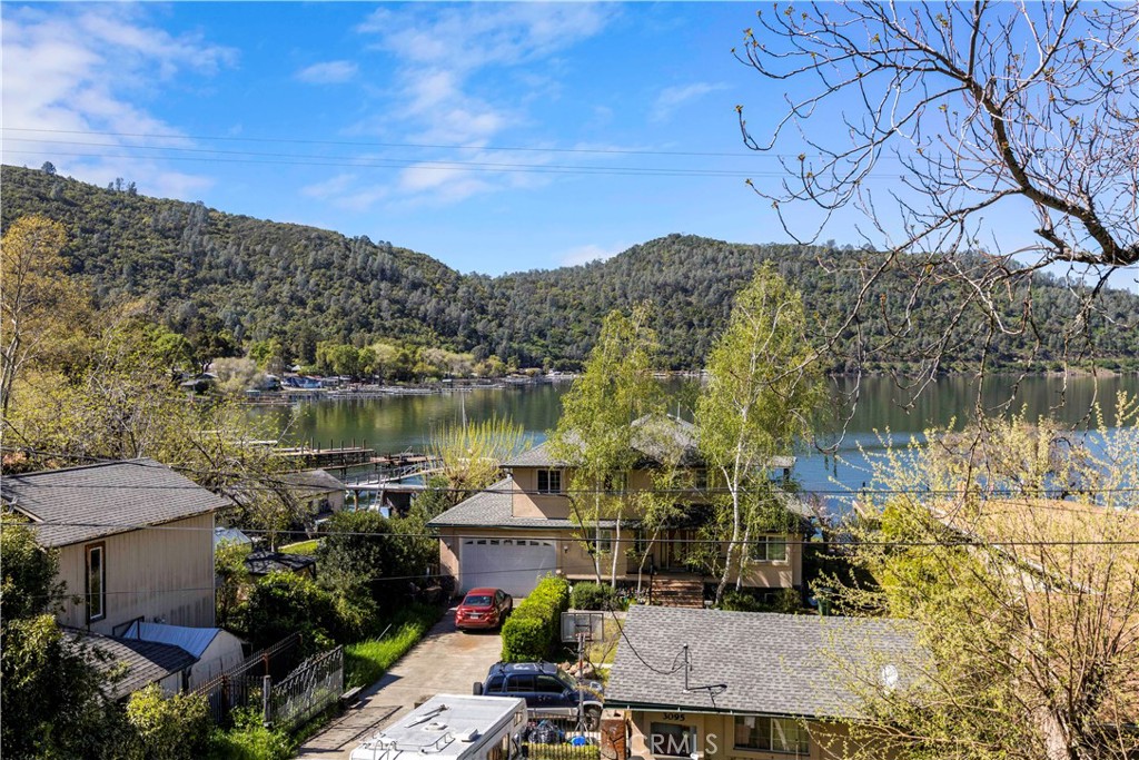 3103 Manzanita Road Kelseyville, CA 95451 - Photo 51 of 62 a view of a lake with a house in the background