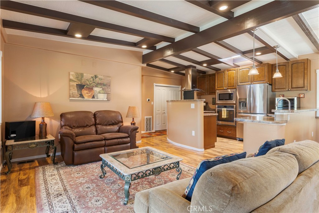 3103 Manzanita Road Kelseyville, CA 95451 - Photo 6 of 62 a living room with furniture and a view of kitchen