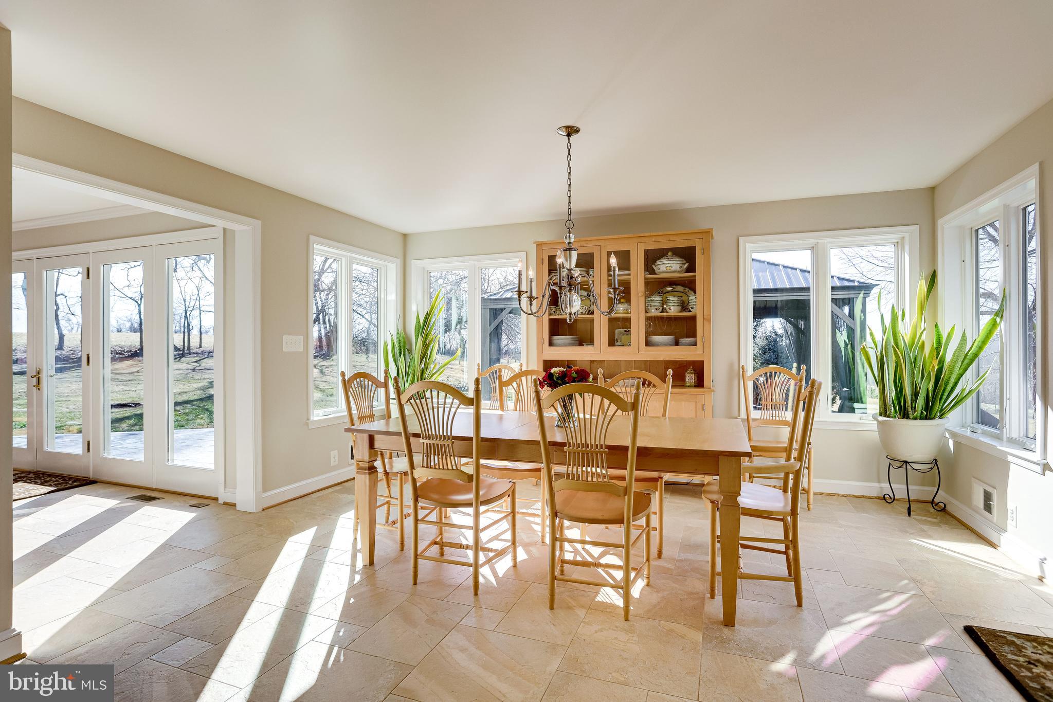 40445 Beechnut Road Leesburg, VA 20175 - Photo 12 of 42 Kitchen Dining Area Opens to Sunroom