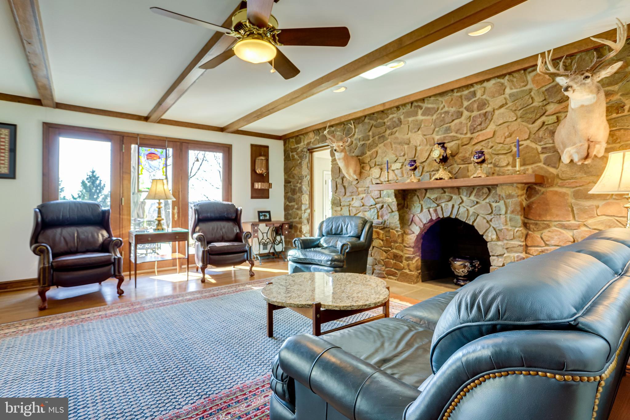 40445 Beechnut Road Leesburg, VA 20175 - Photo 14 of 42 Family Room with Beautiful Stone Work, Fireplace