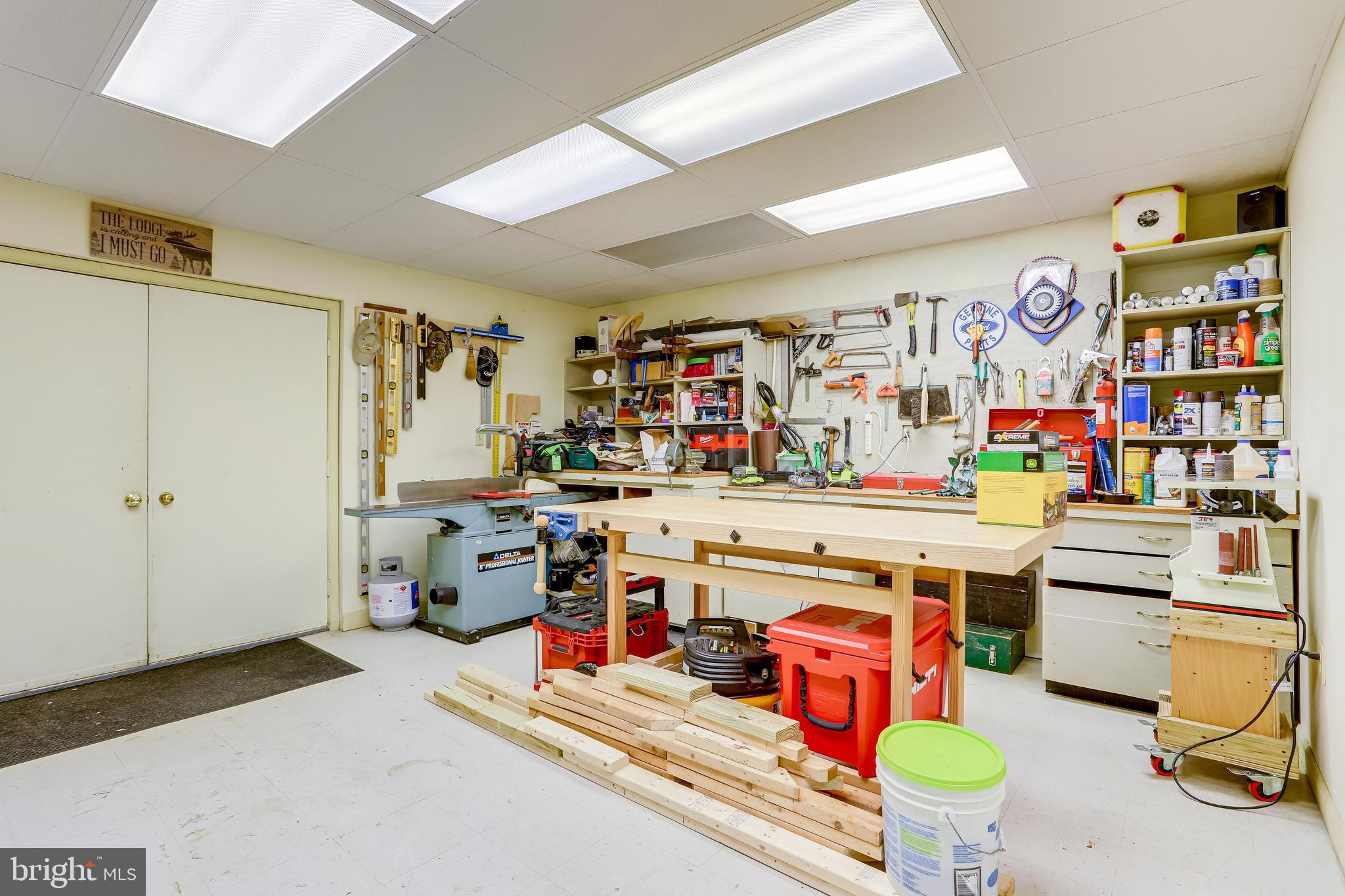 40445 Beechnut Road Leesburg, VA 20175 - Photo 32 of 42 Multiple workshops in basement, plus a living area