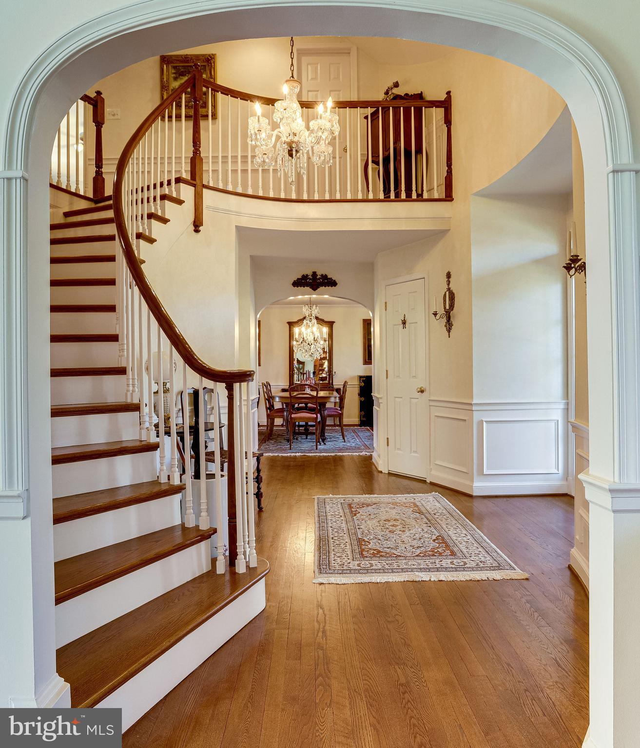 40445 Beechnut Road Leesburg, VA 20175 - Photo 6 of 42 Sweeping Staircase With Balcony