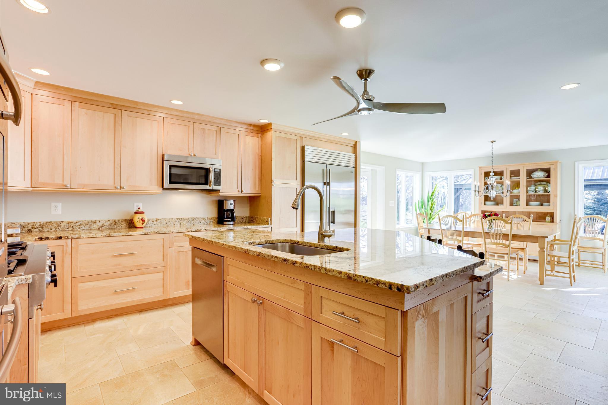 40445 Beechnut Road Leesburg, VA 20175 - Photo 7 of 42 Custom Kitchen with Sunroom and Dining Area
