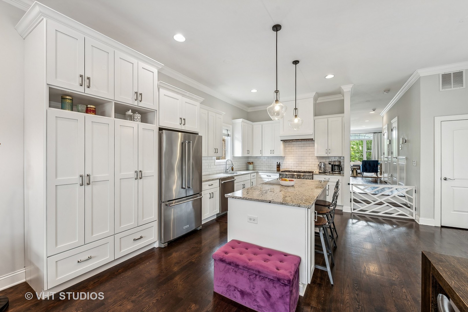3409 North Ridgeway Avenue Chicago, IL 60618 - Photo 15 of 37 a kitchen with stainless steel appliances kitchen island granite countertop a refrigerator and a stove top oven