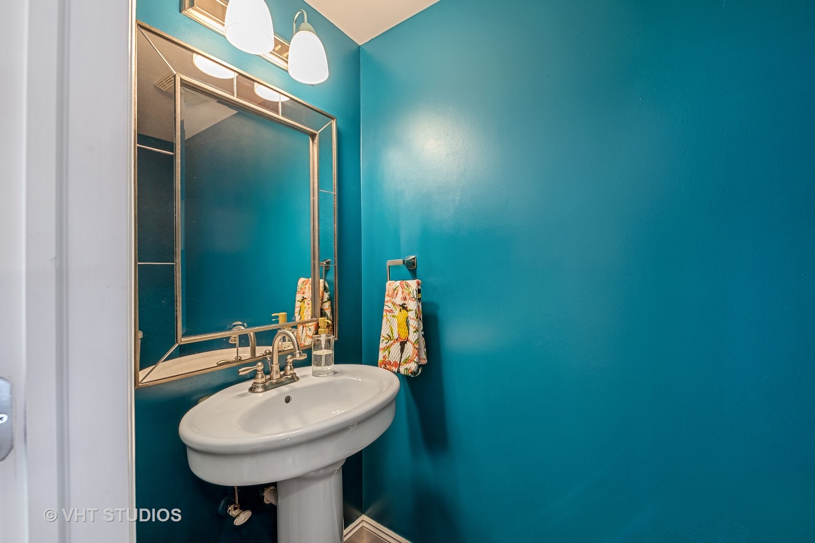 3409 North Ridgeway Avenue Chicago, IL 60618 - Photo 18 of 37 a bathroom with a sink and a mirror