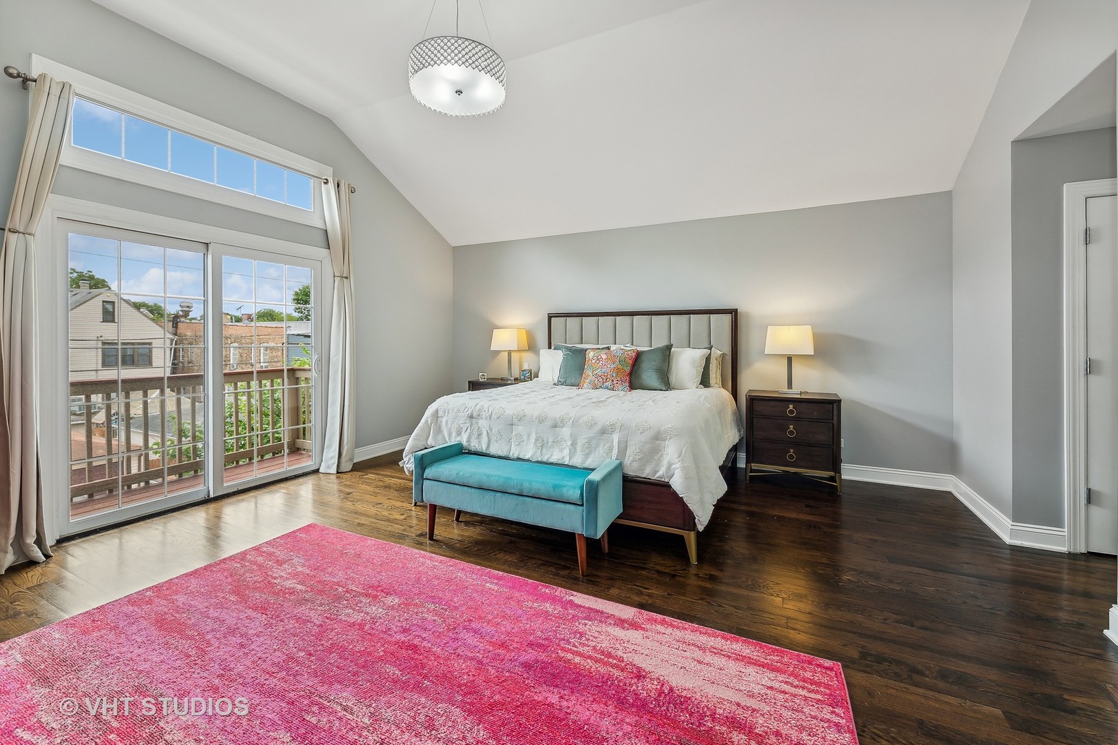 3409 North Ridgeway Avenue Chicago, IL 60618 - Photo 20 of 37 a bedroom with a bed a table and wooden floor
