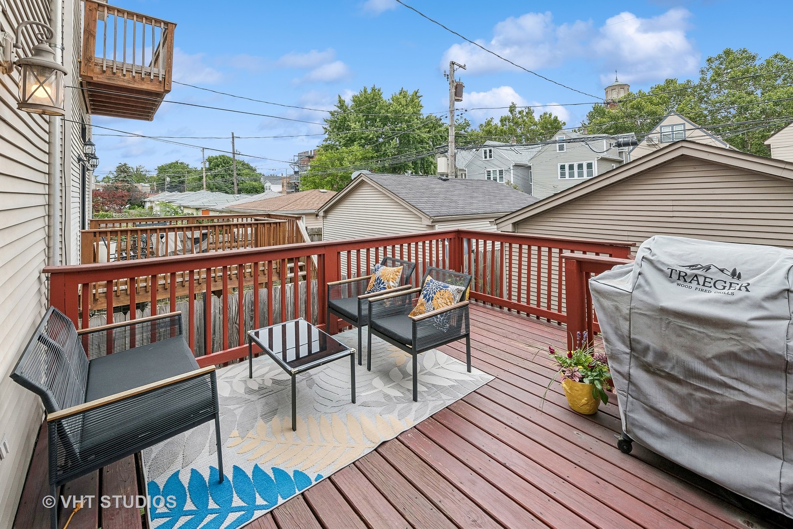 3409 North Ridgeway Avenue Chicago, IL 60618 - Photo 30 of 37 a view of a two chairs and table on the deck